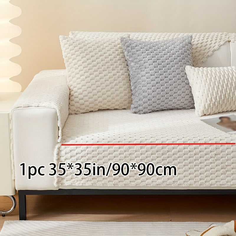 Non-slip sofa cover with honeycomb pattern, ideal for all seasons and protecting furniture in any room.