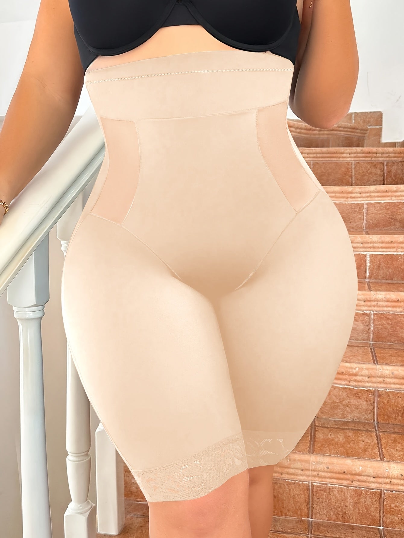 Plus size mid-calf shapewear with sexy hollow design in solid color.