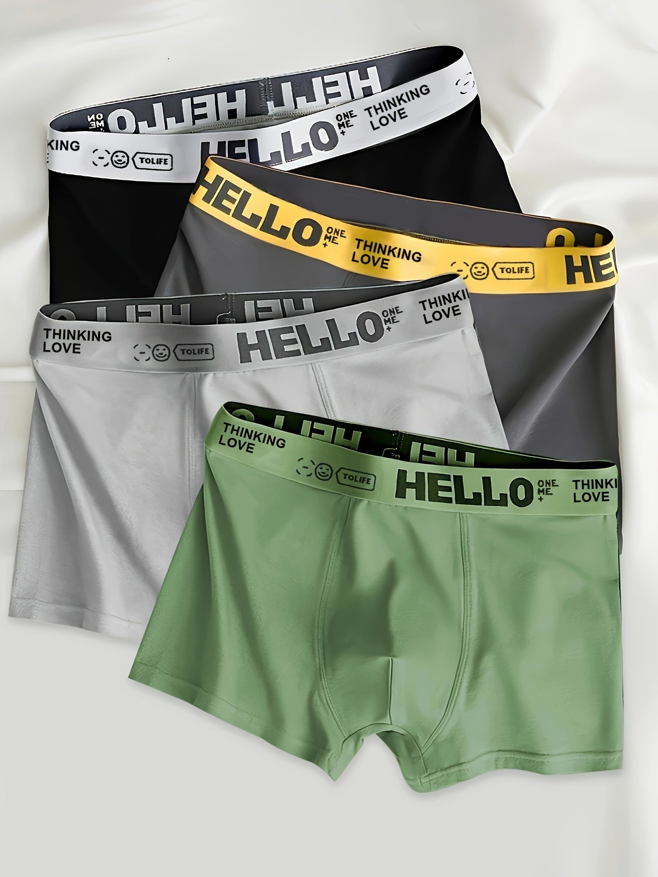 4 Men's Boxer Briefs: Polyester/Spandex blend, mid-waist, solid color, breathable knit fabric