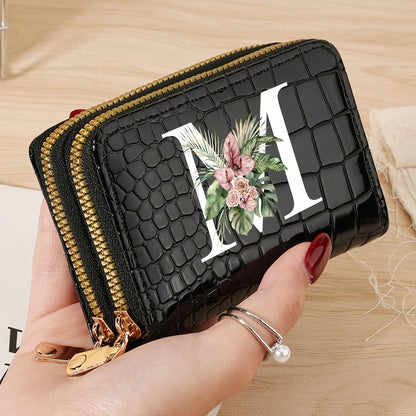 Women's credit card wallet with elegant floral letter print in black & white. Features large capacity, dual zipper, crocodile texture PU, lightweight design with nylon lining for everyday