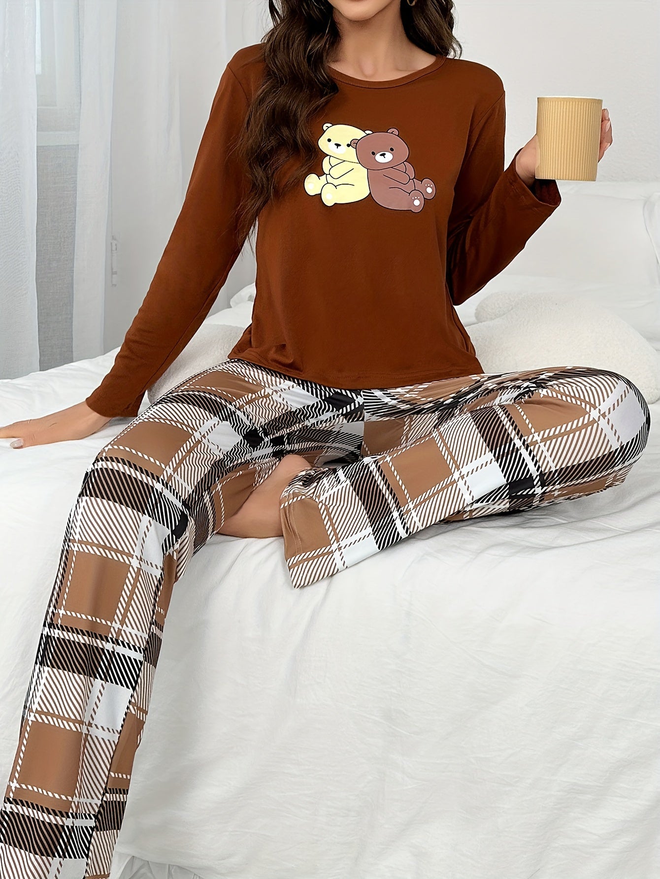 Cozy plaid pajama set for women, perfect for autumn.