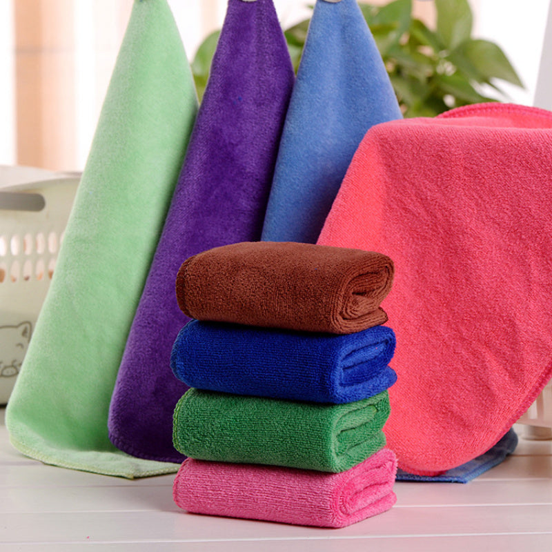 Soft microfiber towel perfect for camping, sports, swimming, and travel - dries quickly and absorbs well.