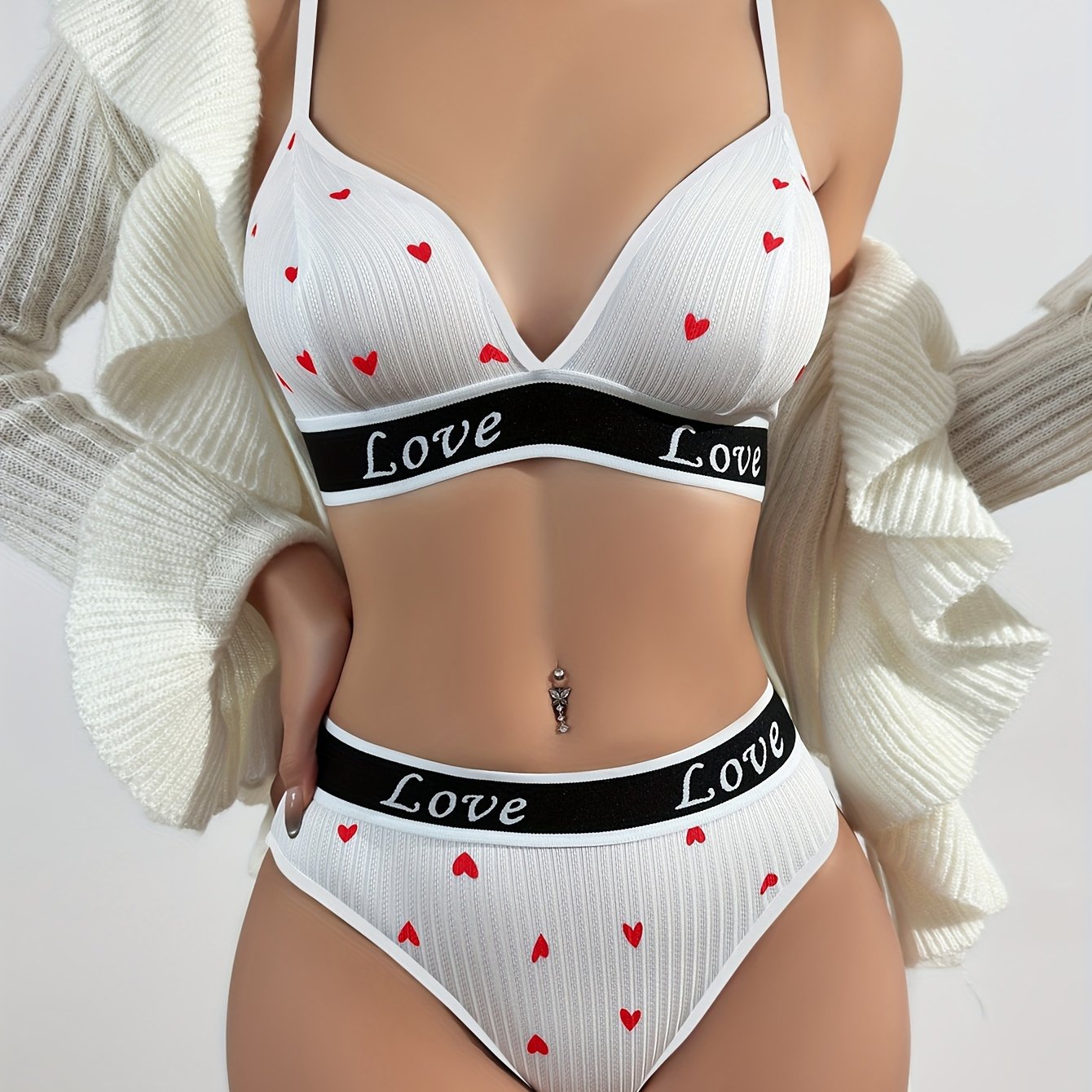 Women's cute cartoon lingerie set made from 90% polyester and 10% elastane. Includes letter and lip print bikini and triangle panties. Skin-friendly and comfortable knit fabric.