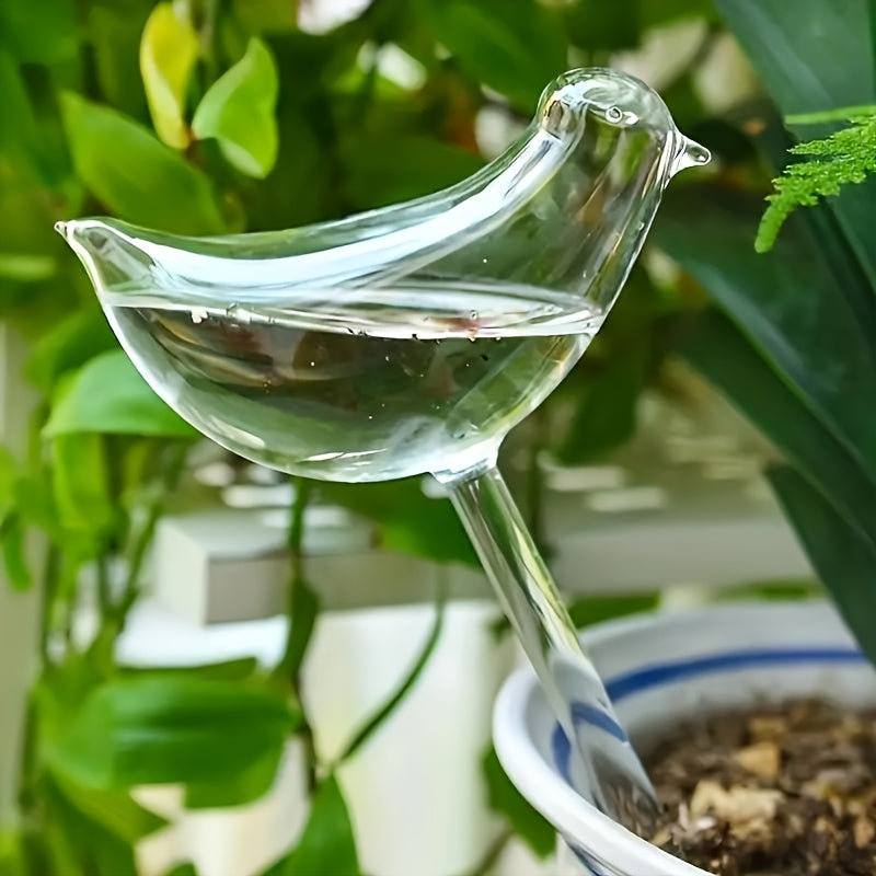 5 bird-shaped self-watering globes for indoor and outdoor plants.