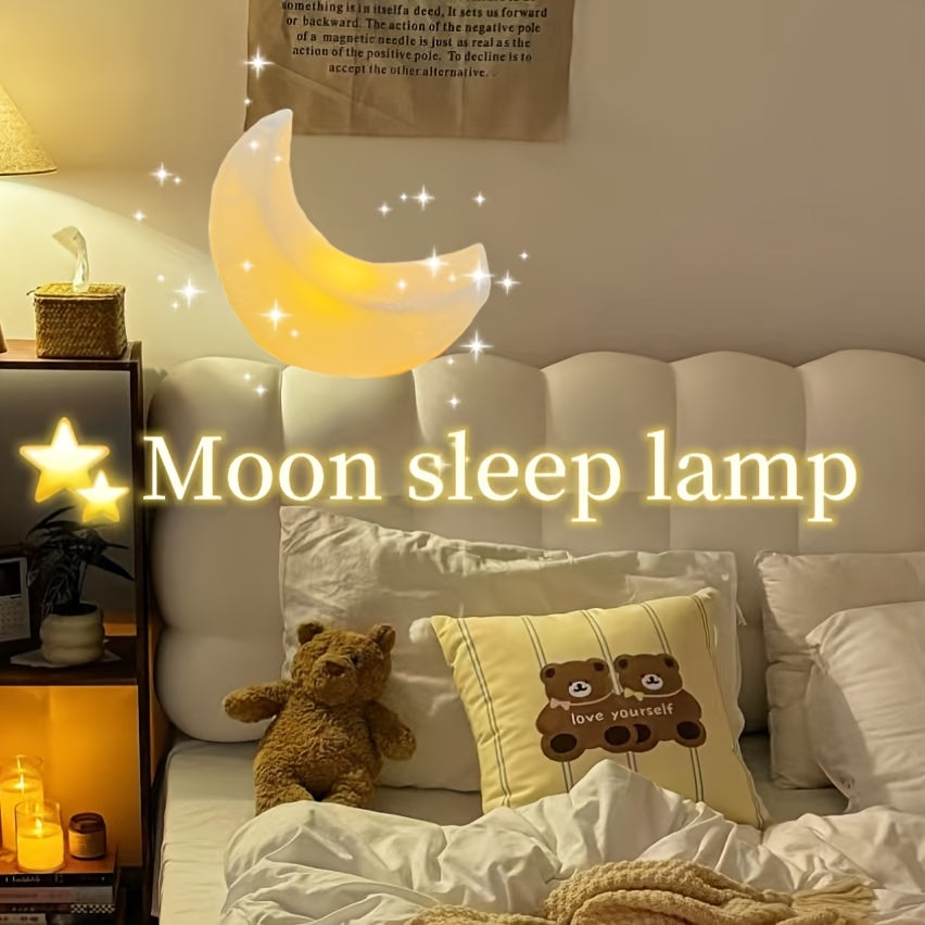 Portable Nordic-style LED moon-shaped lamp perfect for the bedroom, powered by batteries and ideal as a holiday decoration or gift.