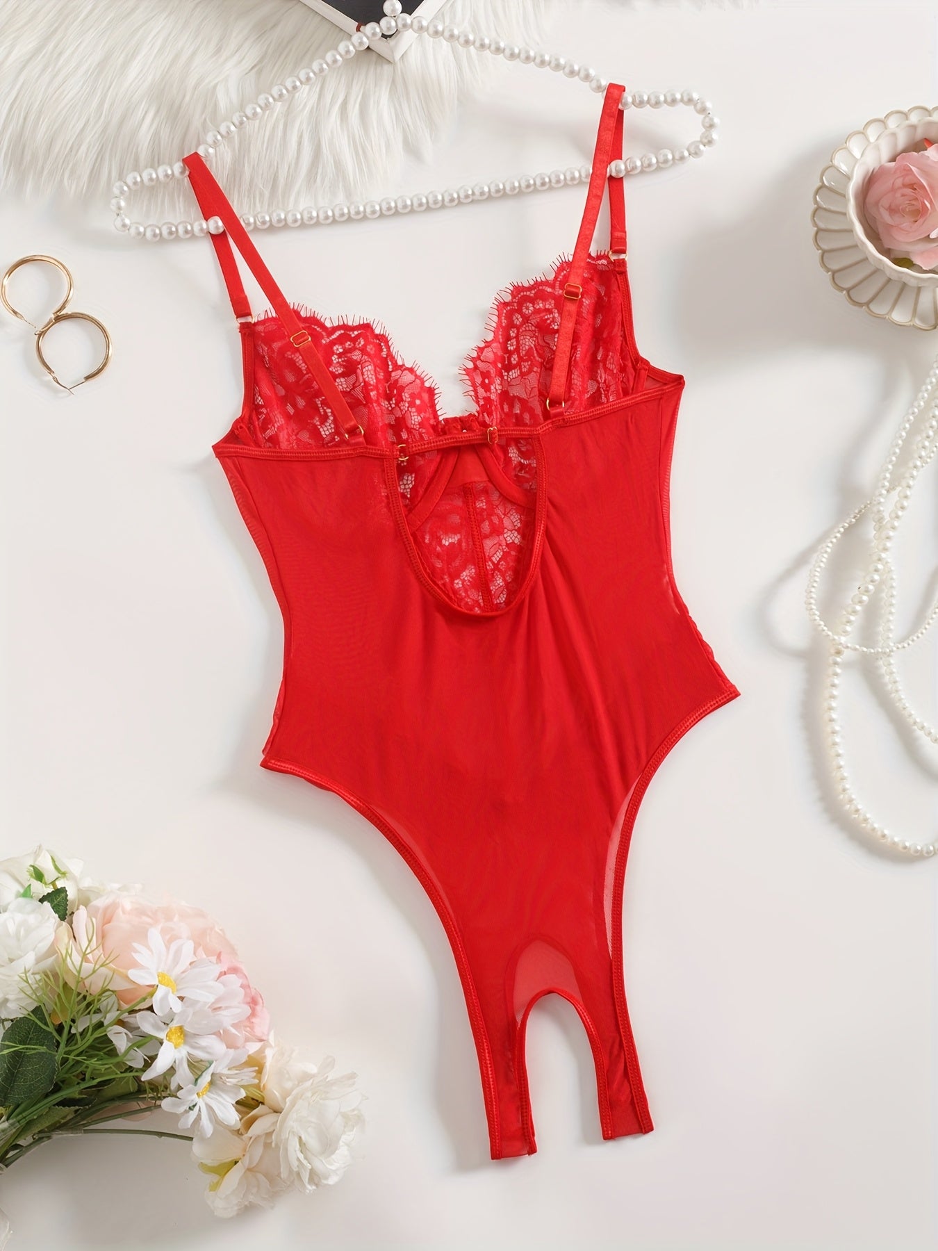 Red lace velvet teddy with ruffled detailing, underwire support, and high-cut, backless design. Features floral lace patterns, adjustable straps, and semisheer texture with lace trim.