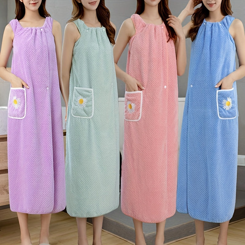 Adults' wearable bath towel features pockets, buttons, and quick-drying, absorbent material. Perfect for home spa or sauna use.