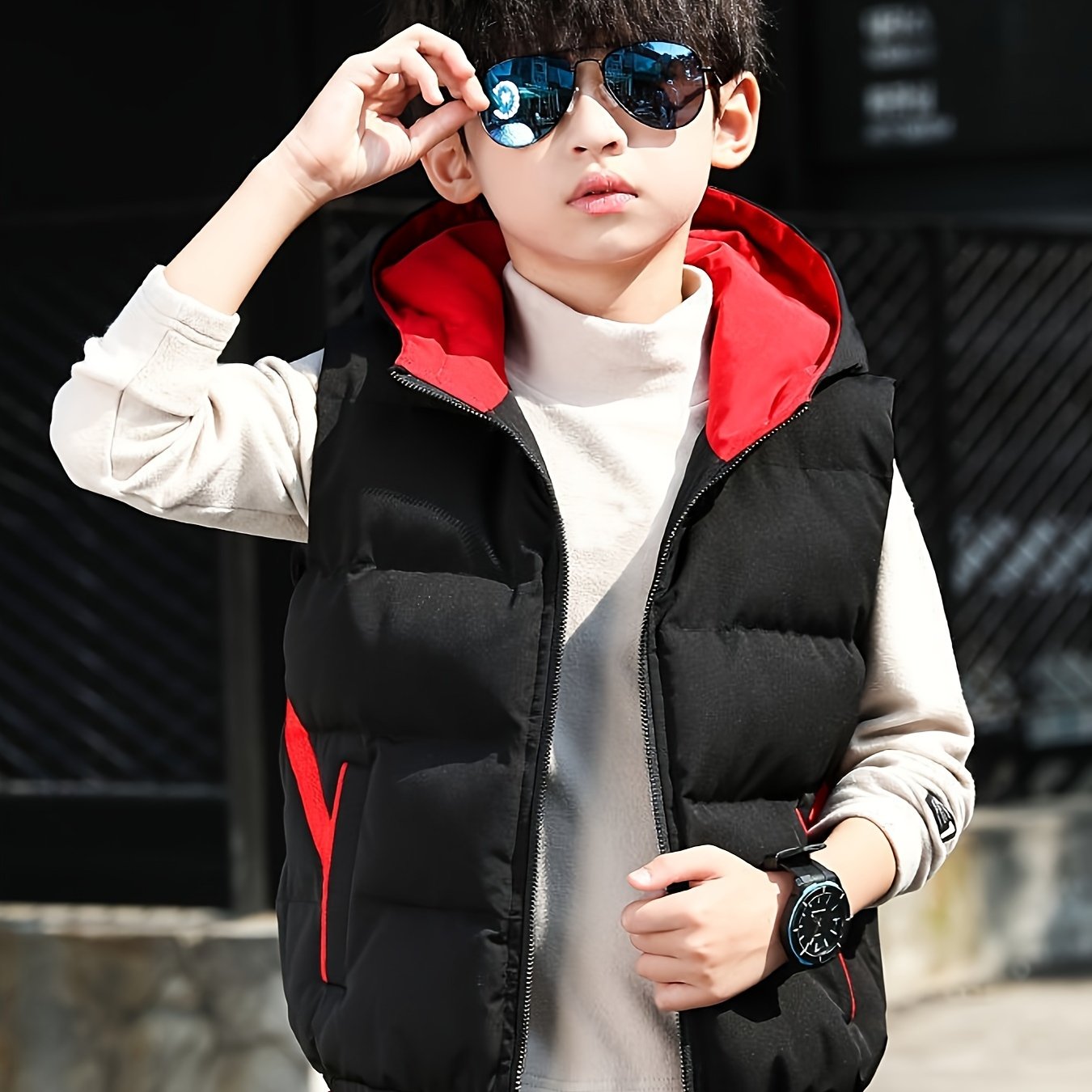 Boys' warm zip-up hooded vest with pockets, cozy color block top for fall and winter.