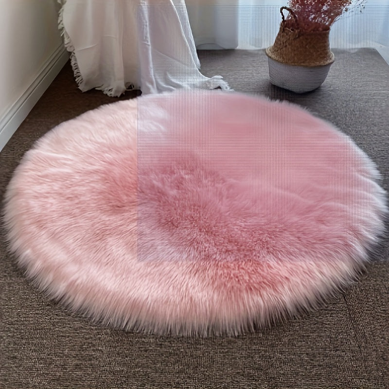 Round luxury area rug made from soft faux fur material with high pile and knit weave, machine washable, lightweight and fluffy. Crafted from a blend of polyester and acrylic in a solid color design. Perfect for adding a cozy touch to bedroom, living