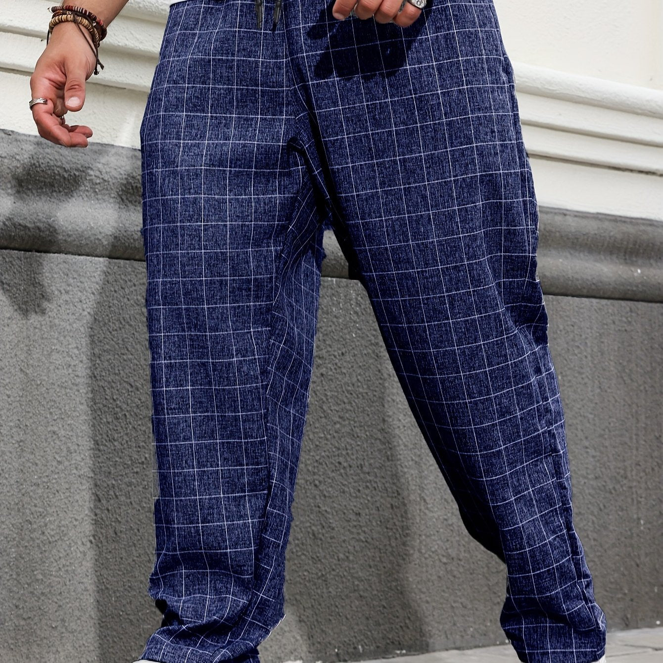 Oversized plaid pants for plus size men in breathable polyester for all seasons.