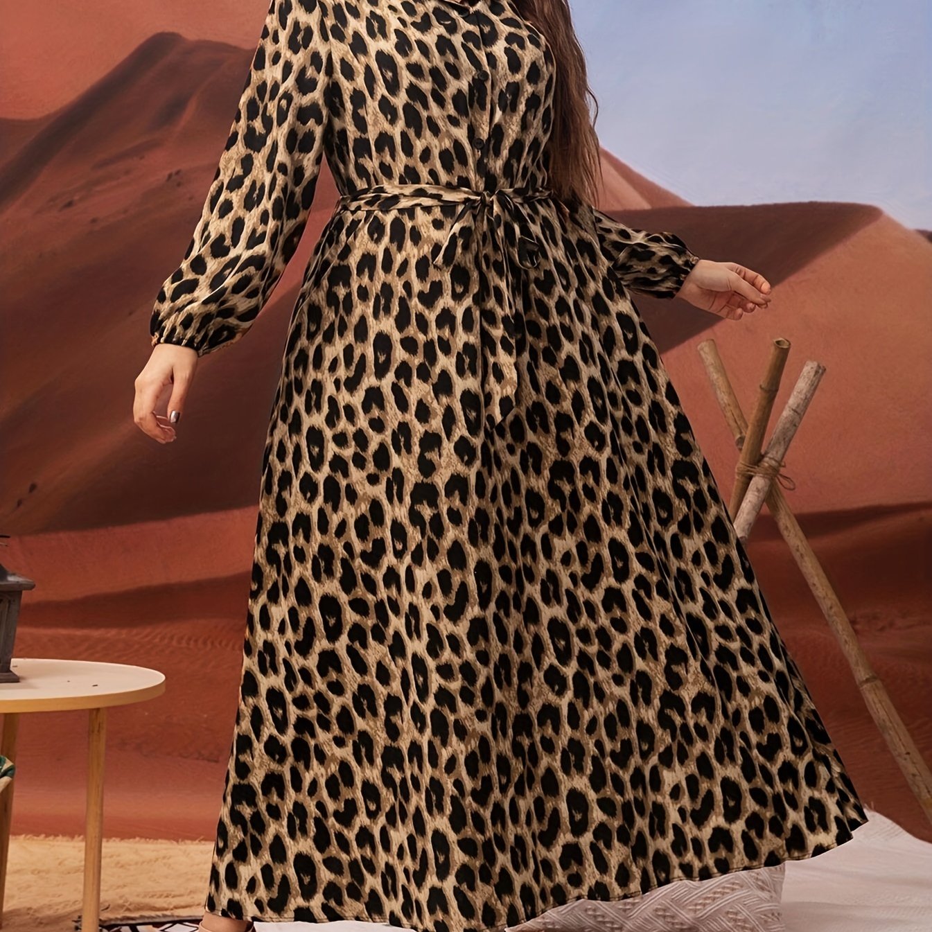 Plus-size leopard print dress with lantern sleeves, belt, collared neckline, and non-stretch polyester material. Machine washable and suitable for all seasons and occasions.