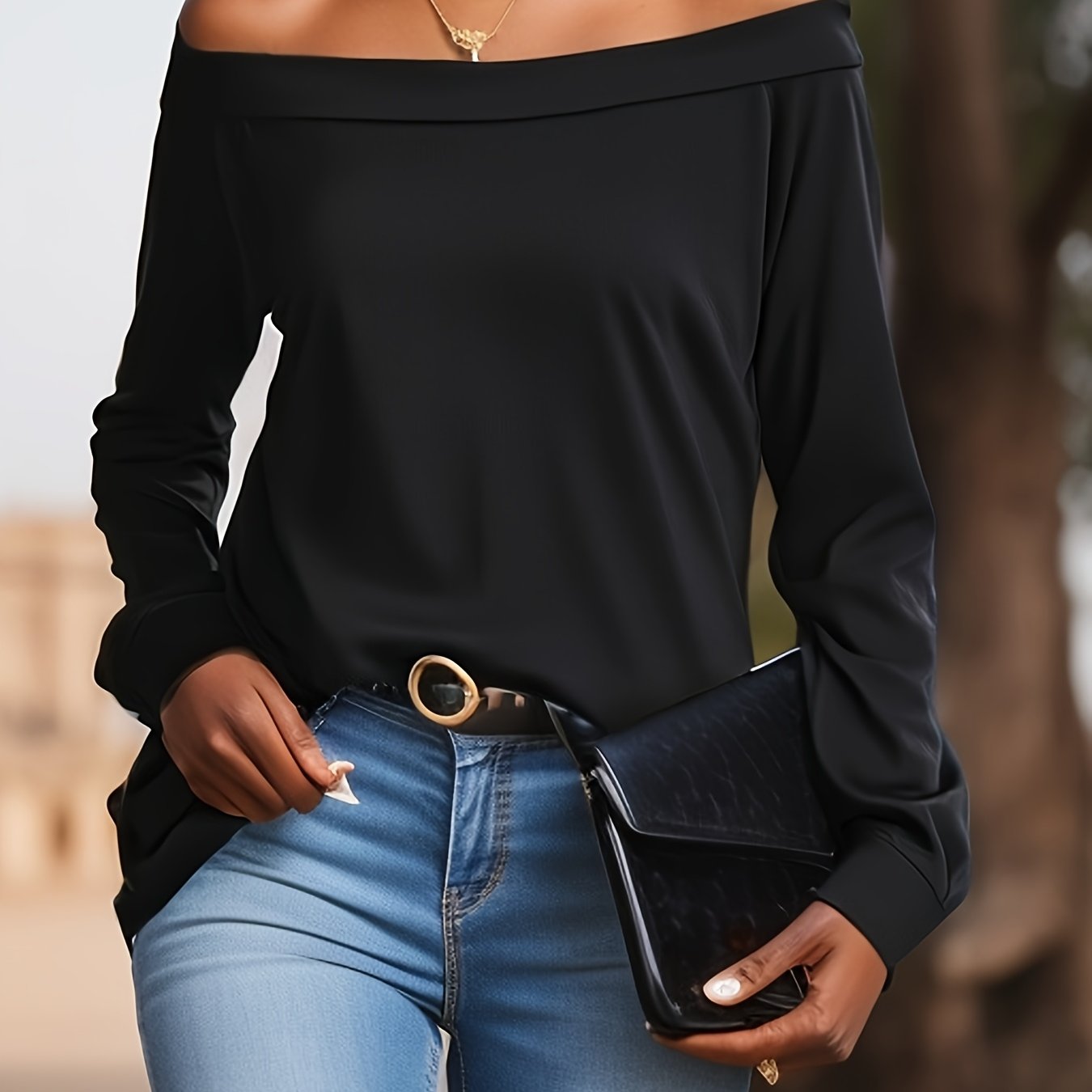 Stylish off-shoulder lounge top with long sleeves for fall, made of stretchy fabric for women's loungewear.