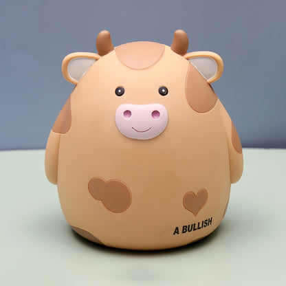 Cute cow-shaped penny bank, perfect for saving money and as a creative gift for birthdays and Christmas. Made of non-waterproof PVC with latch closure, ideal for desk decor.