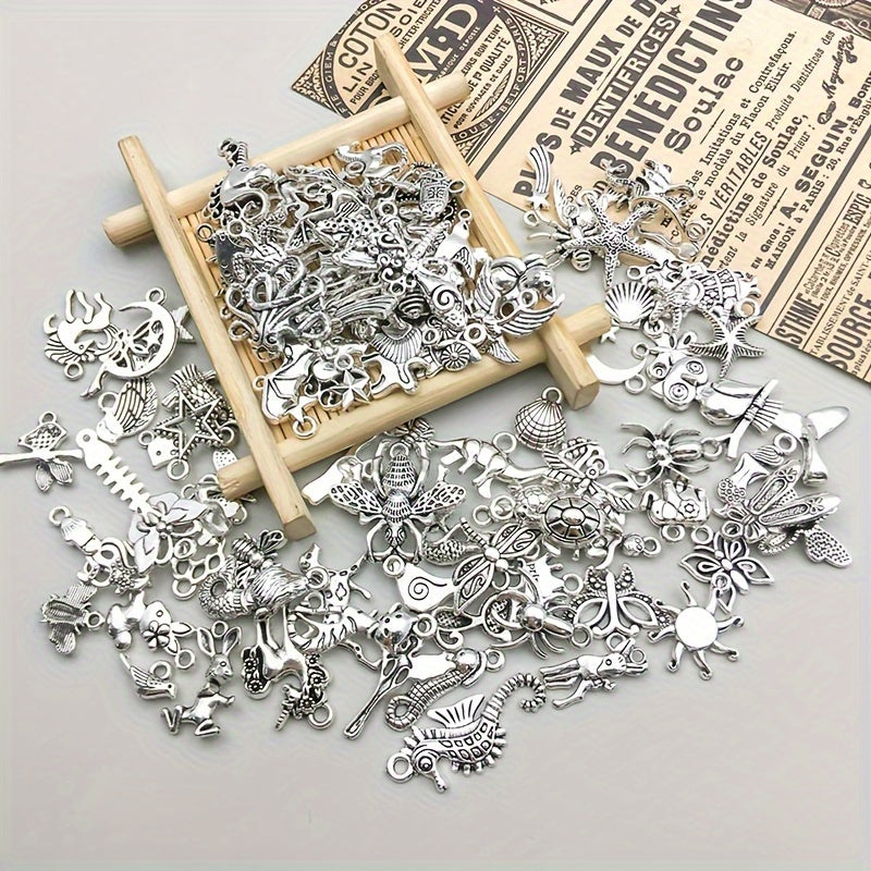 100 pieces of metal mixed jewelry making charms, vintage animal charms for DIY necklace making.