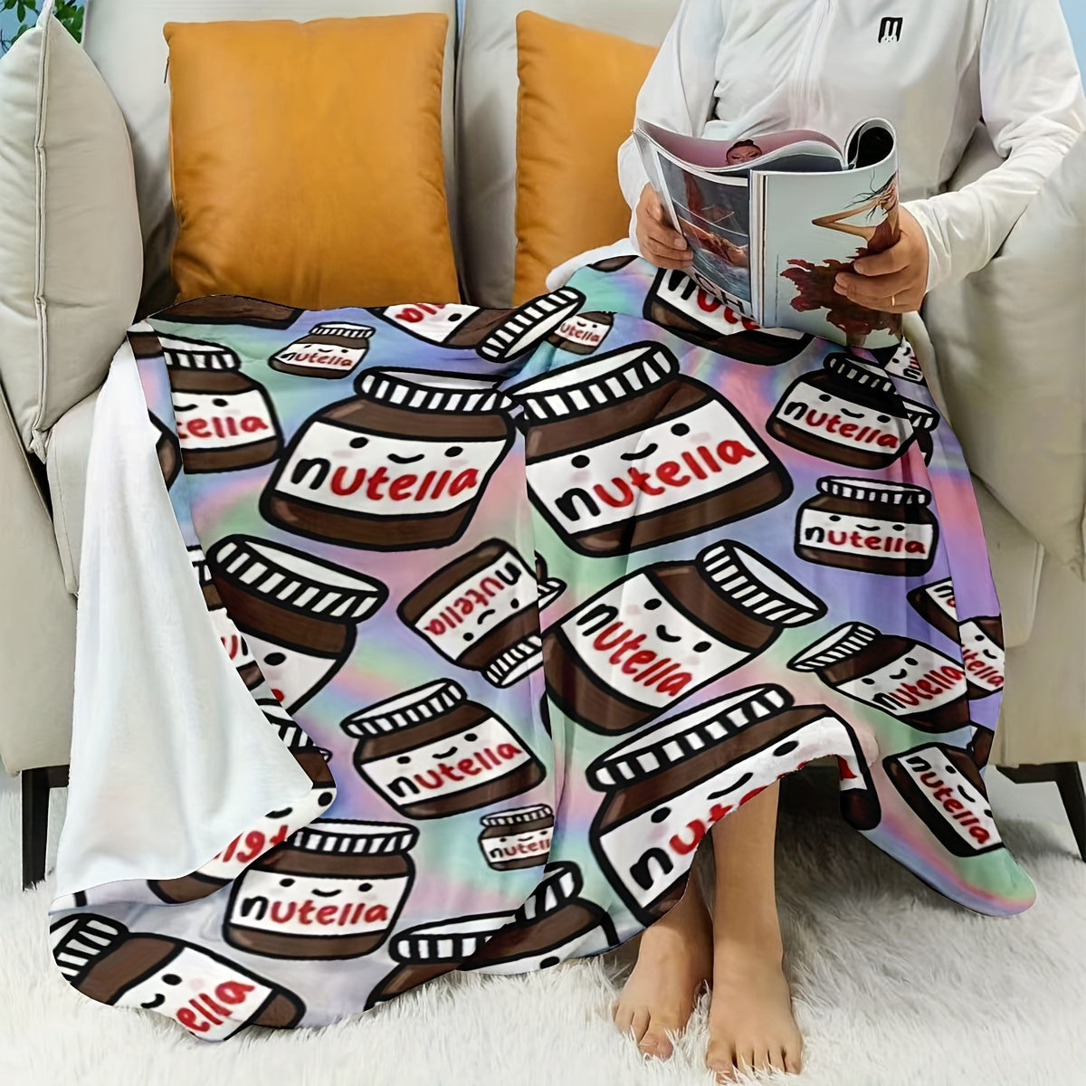 Soft and warm Nutella-themed flannel throw blanket featuring a contemporary design. This all-purpose blanket is perfect for any season and can be used at home, in the office, during fitness activities, while traveling, camping, on the couch, chair, or