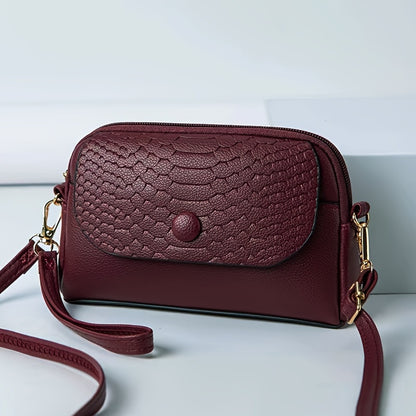 Stylish mini crossbody bag for women with removable strap and zipper closure. Suitable for commuting and shopping.