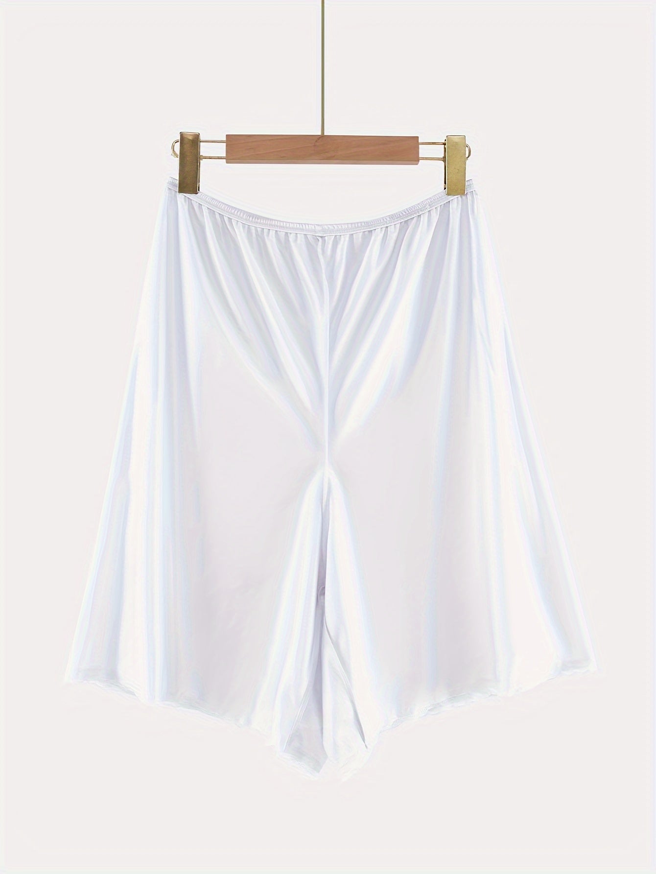 Polyester slip skirt with lace trim, light support shapewear.