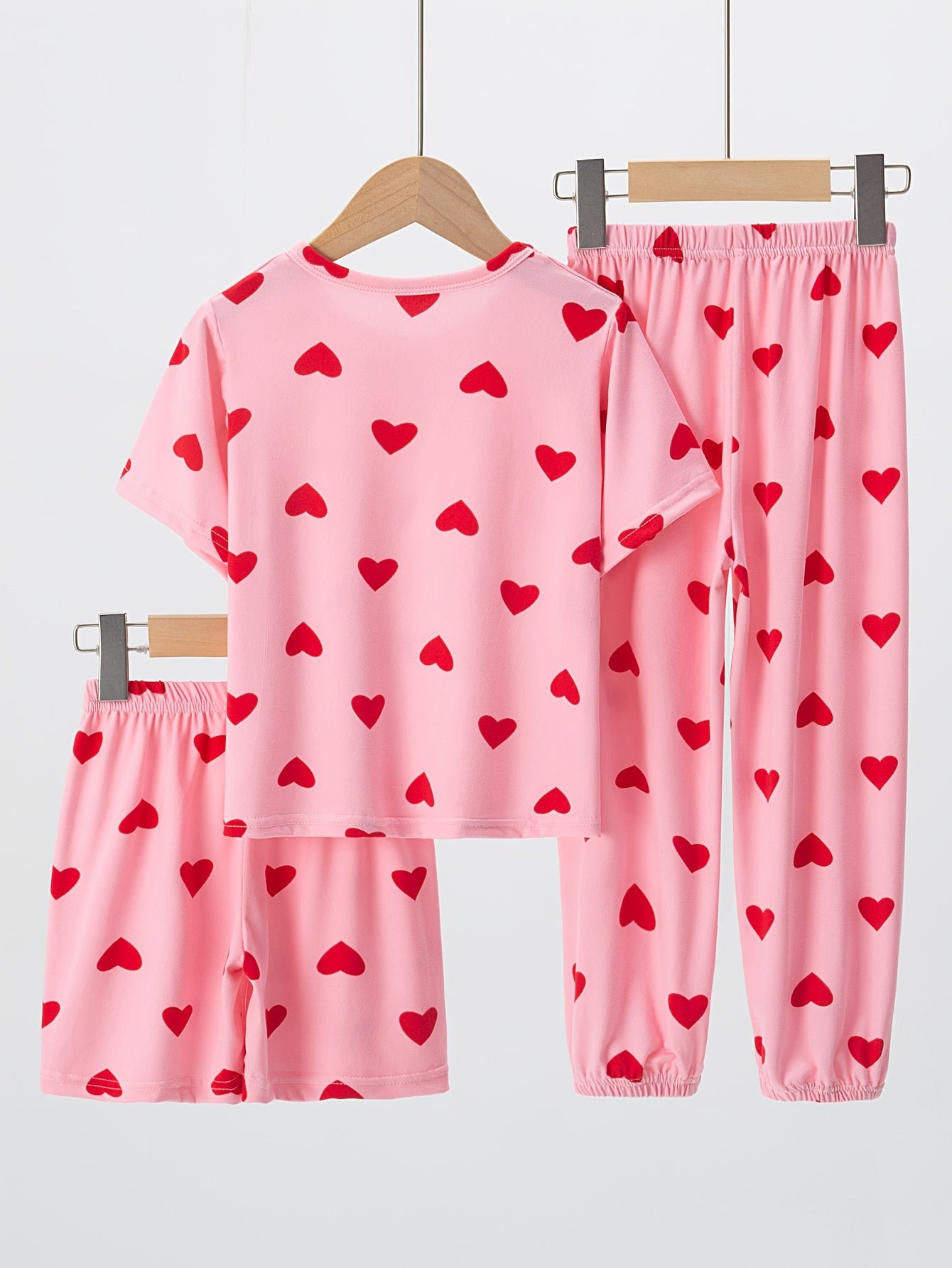 BAIOUNIAO Girls' 3-piece Flame-Resistant Pajama Set in Pink Heart Print, includes Short Sleeve Top, Shorts, and Long Pants, suitable for ages 4-13. Made of breathable and lightweight