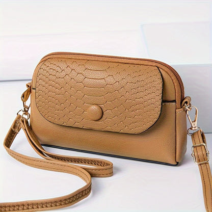 Stylish mini crossbody bag for women with removable strap and zipper closure. Suitable for commuting and shopping.