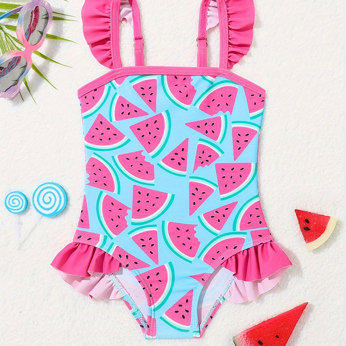 Adorable pineapple pattern one-piece girls' swimsuit in quick-dry, stretchy polyester with ruffle detail, off-shoulder design for toddlers.