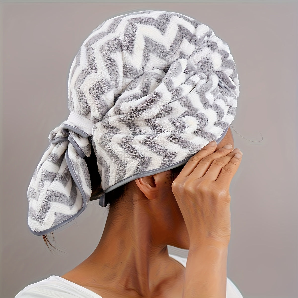 Ultra-soft hair towel wrap for women with quick dry and super absorbent features. Ideal for both long and short hair, with a modern geometric design - a bathroom essential.