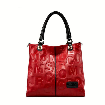 Luxurious red cowhide tote bag for women with geometric pattern, zip closure, polyester lining, and genuine leather material.