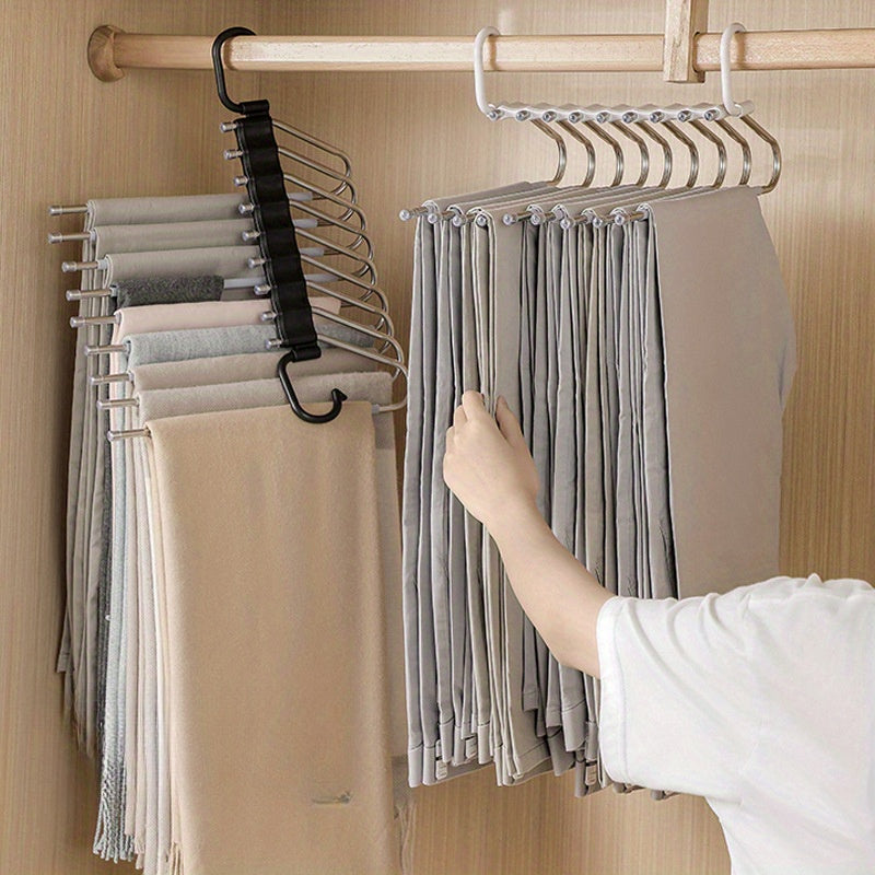 This multi-functional trouser hanger is made of stainless steel and can fold for convenient storage. It features multiple layers for organizing trousers and is a seamless addition to any wardrobe for efficient storage.