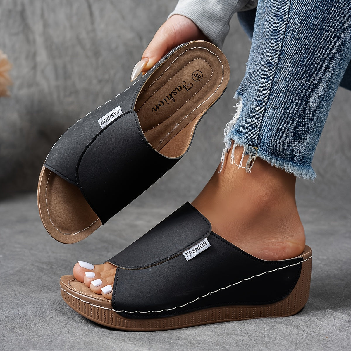 Comfortable slides with arch support and breathable design for stylish and versatile everyday wear.