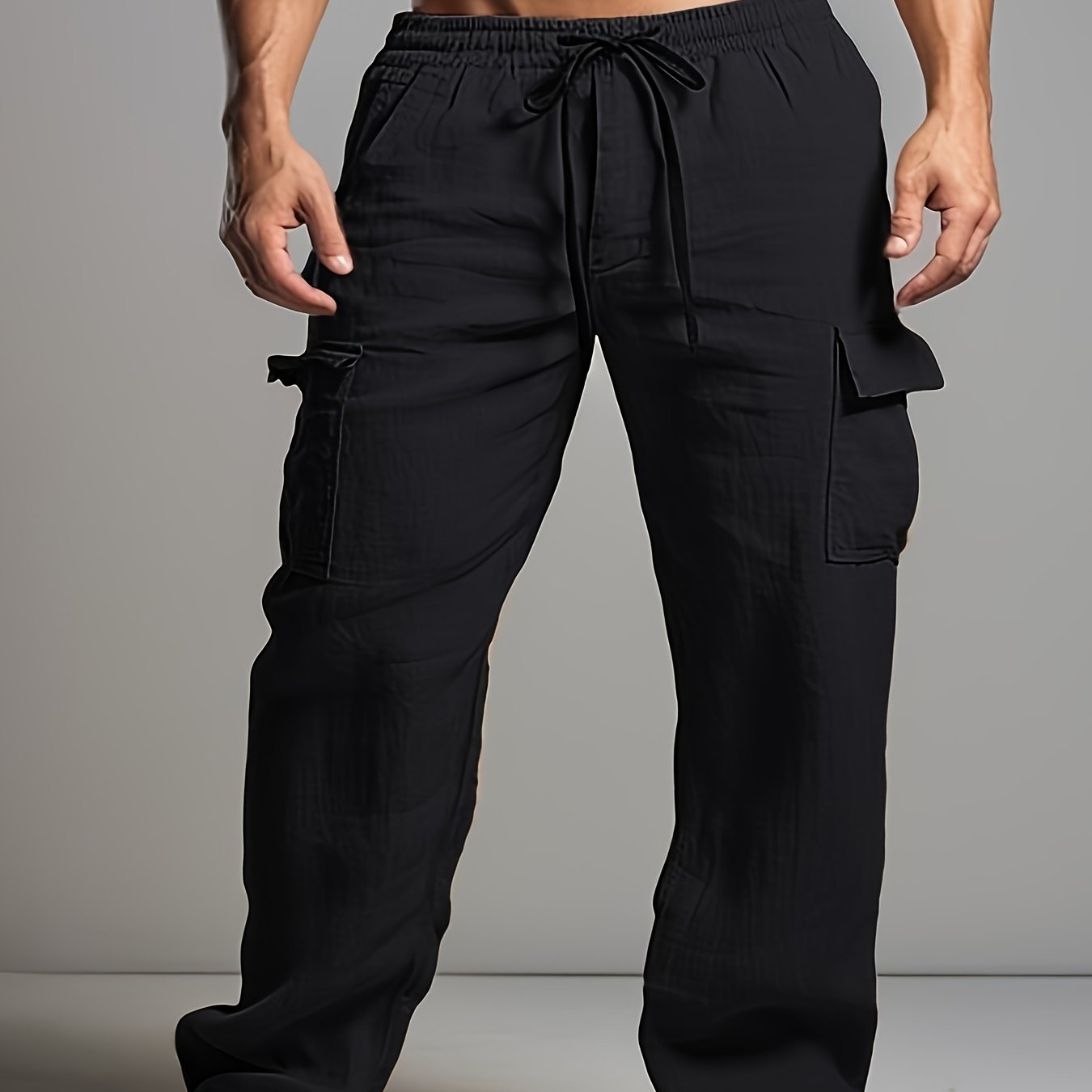 Retro men's cotton and linen drawstring trousers with multiple pockets for outdoor daily wear.