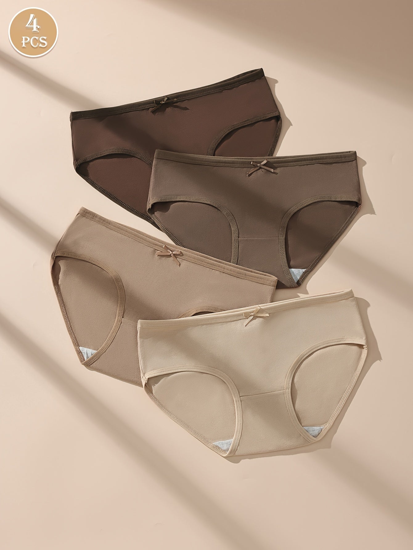 4 Maillard Color briefs for women in beige, brown, and nude shades. Sexy, comfortable, and breathable with bow detail and stretchy, non-see-through fit.