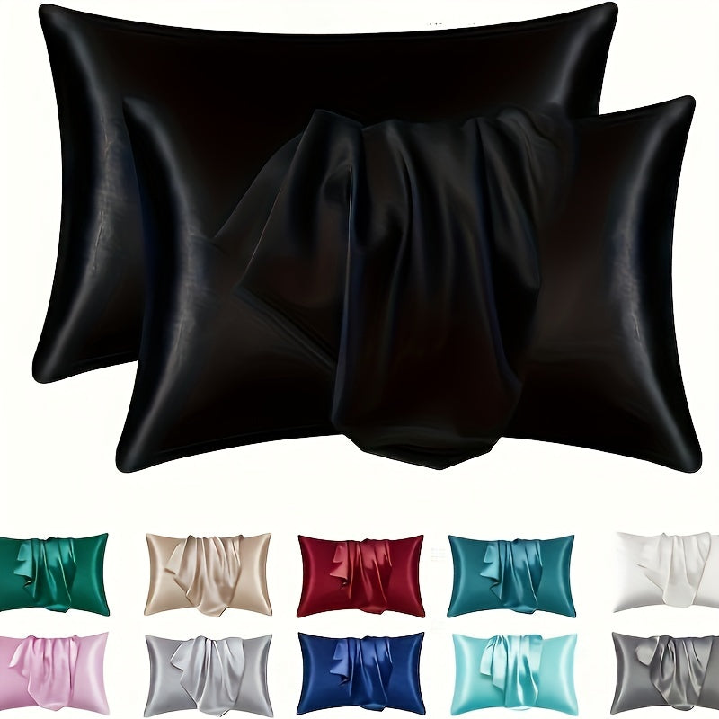 Two luxurious silky soft pillowcases with breathable and skin-friendly cooling feel. Solid color with envelope closure. Machine washable. Set of two.