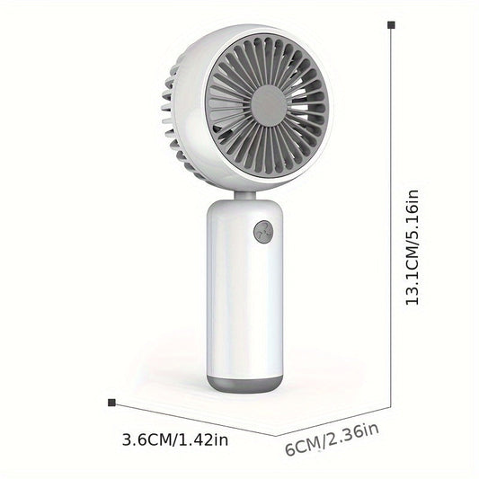 Small handheld portable fan with USB rechargeable battery, three adjustable speeds, and wearable design for use both indoors and outdoors.