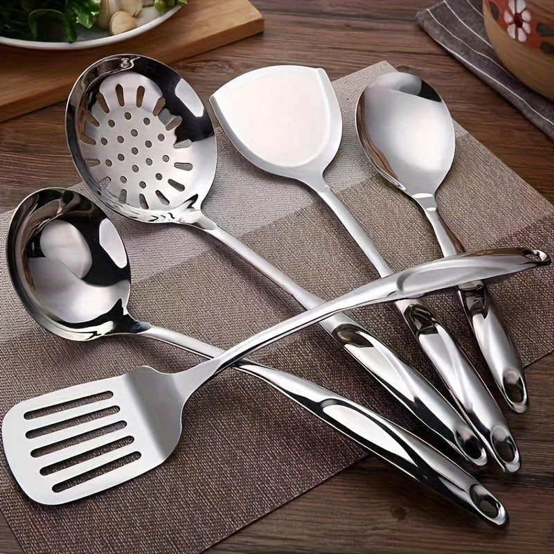 Six-piece set of kitchen utensils made of stainless steel, featuring hollow handles and a mirror finish. These cooking tools are not only durable and elegant but also easy to clean, making them the perfect addition to your kitchen gadgets collection.