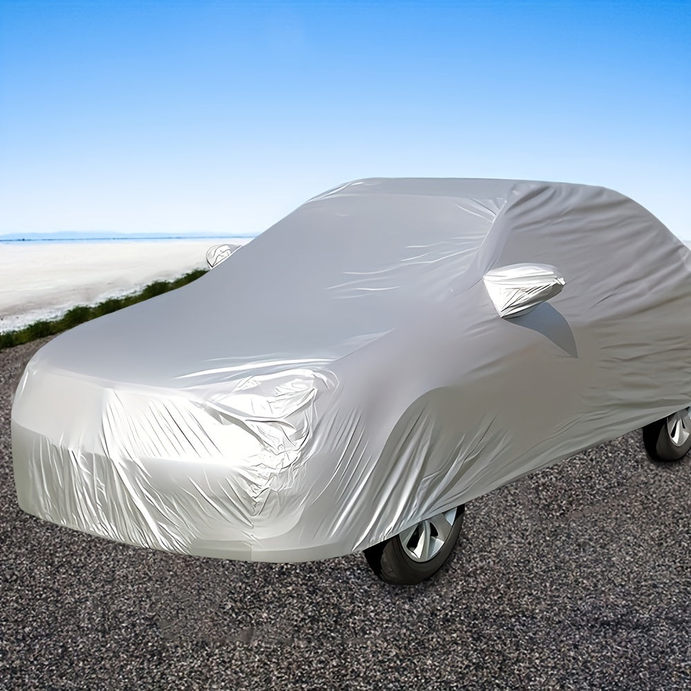 Silver car cover offers UV protection, heat insulation, and waterproofing with a metallic texture for full sunshade and dust cover.