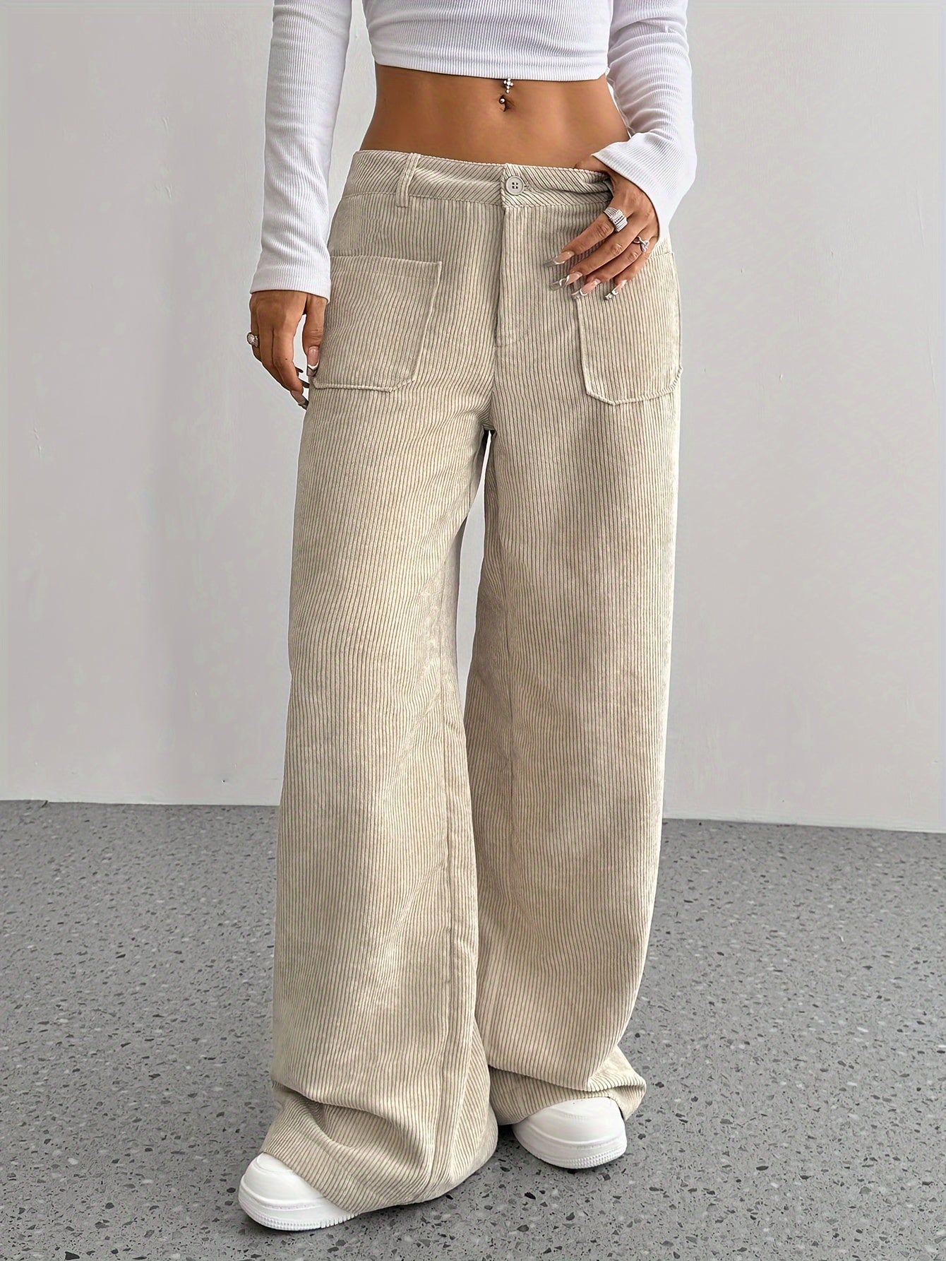 Casual corduroy wide leg pants for women made of polyester, suitable for all seasons.