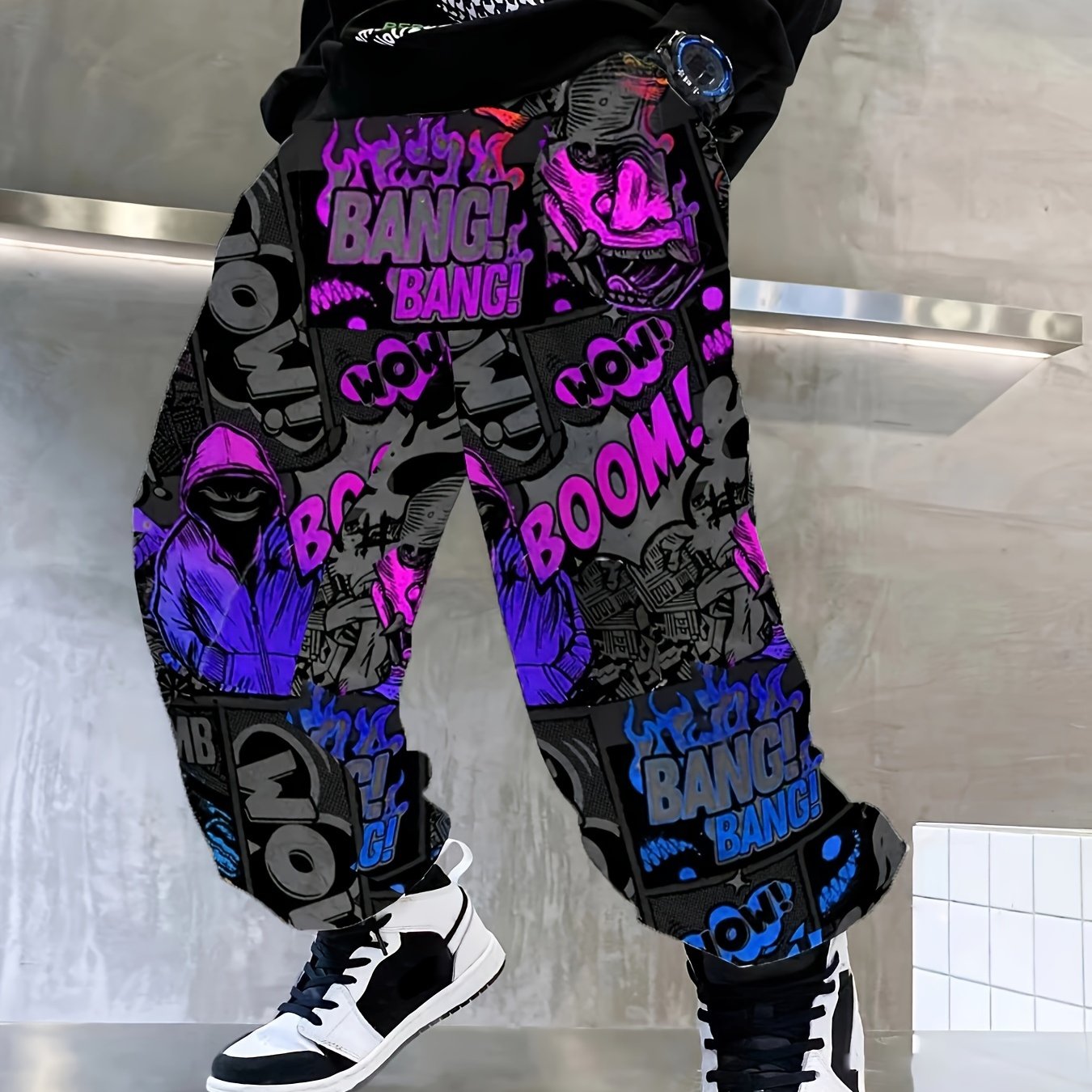 Comfy boys joggers with graffiti and ink splashes, elastic waist.