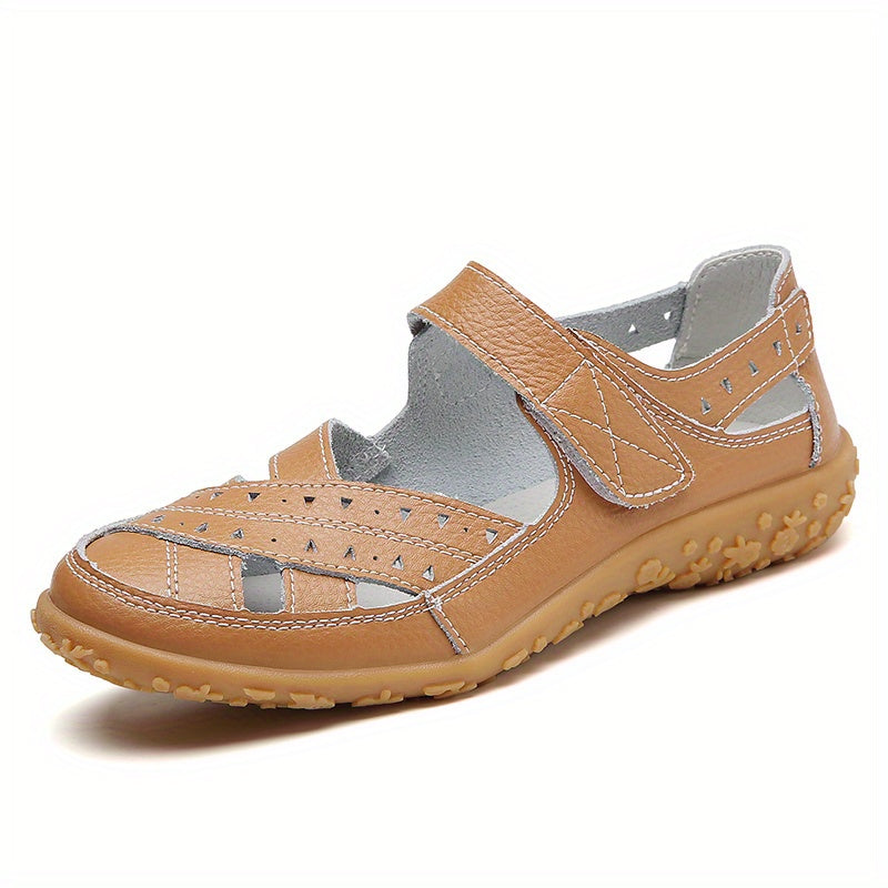 Flat heel round toe strappy back synthetic beach shoes for women, featuring hook-and-loop fastener.