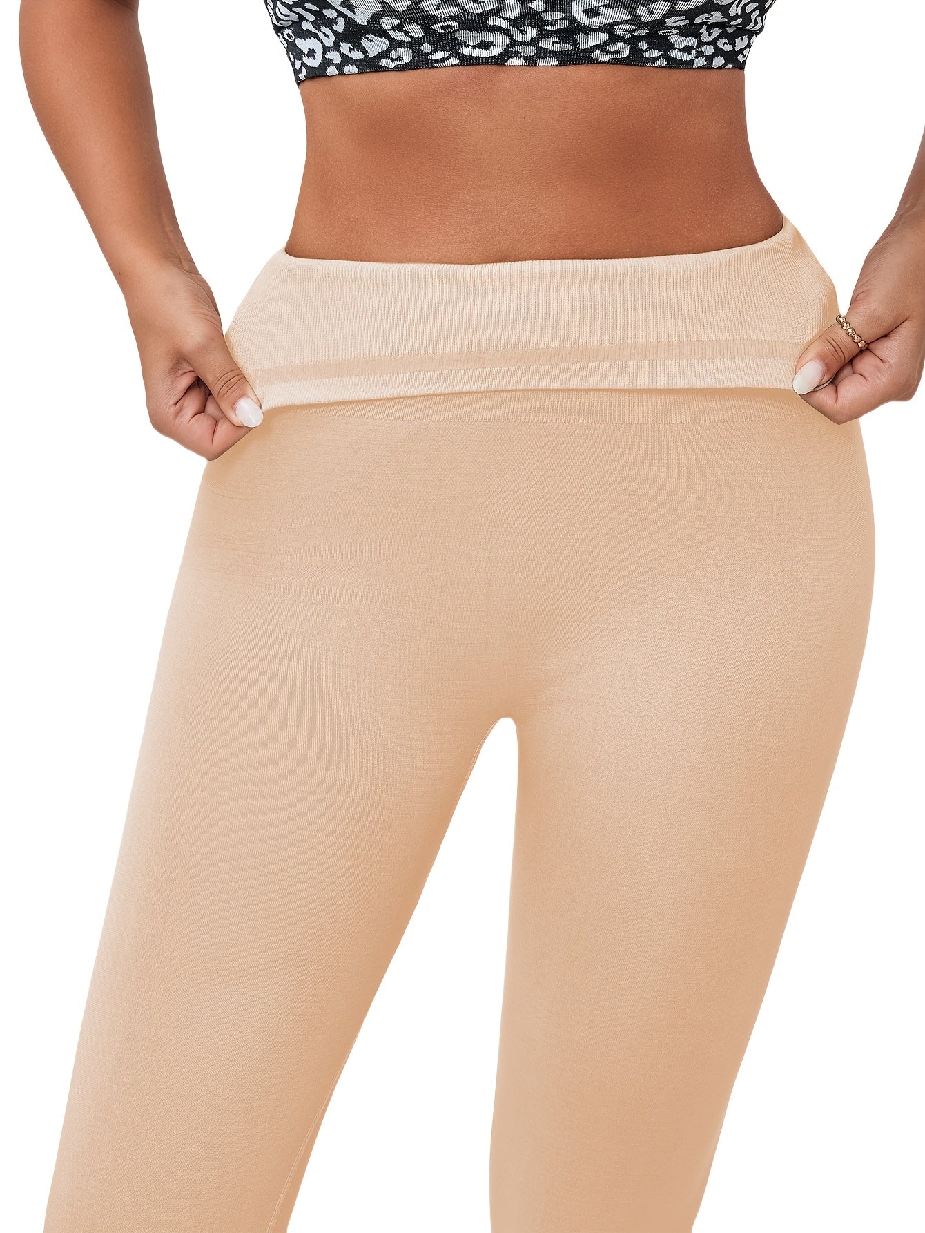 High-waist seamless leggings made of polyamide knit fabric, in solid color with high support, featuring anti-flab silicone strip for yoga and sports.