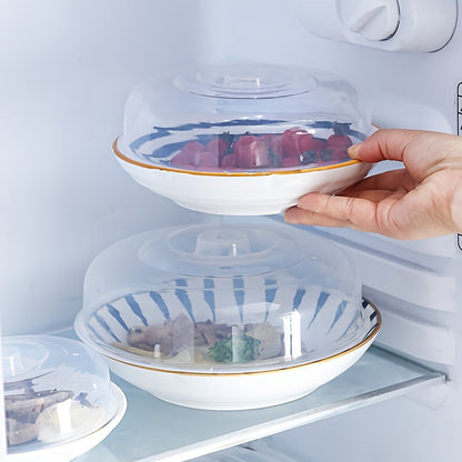 A microwave-safe lid made of clear plastic, designed for bowls with a diameter of 23cm/9.06in, safe for contact with food.