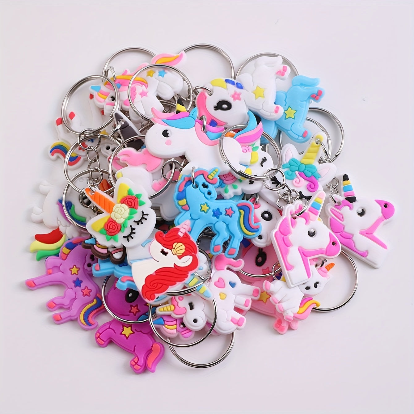 26 DIY cartoon unicorn keychains made of PVC material, perfect for adding a touch of whimsy to your lady's bag or keyring. Ideal for birthday gifts and featuring an adorable animal theme.