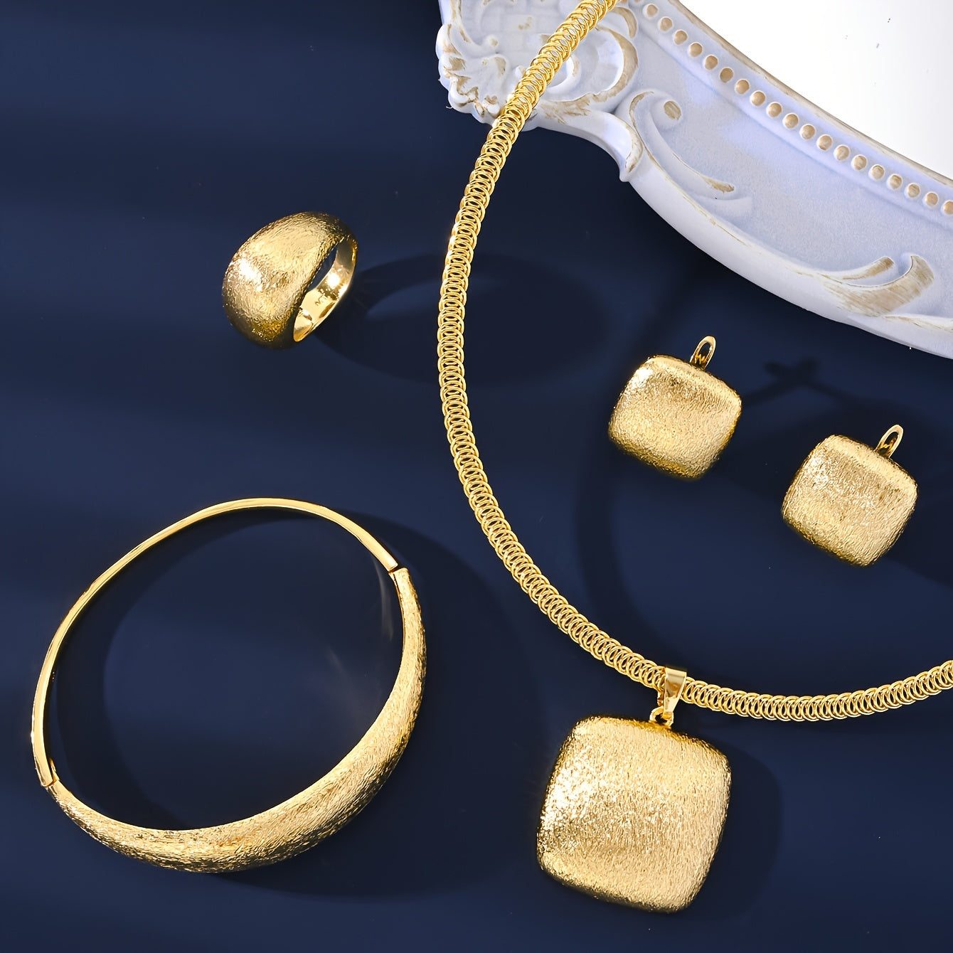 Vintage Style Jewelry Set with 4 Pieces - Necklace, Bracelet, Ring, Earrings. Made of 18K Gold Plated Copper. Perfect for Women, Suitable for Both Daily Wear and Special Occasions.