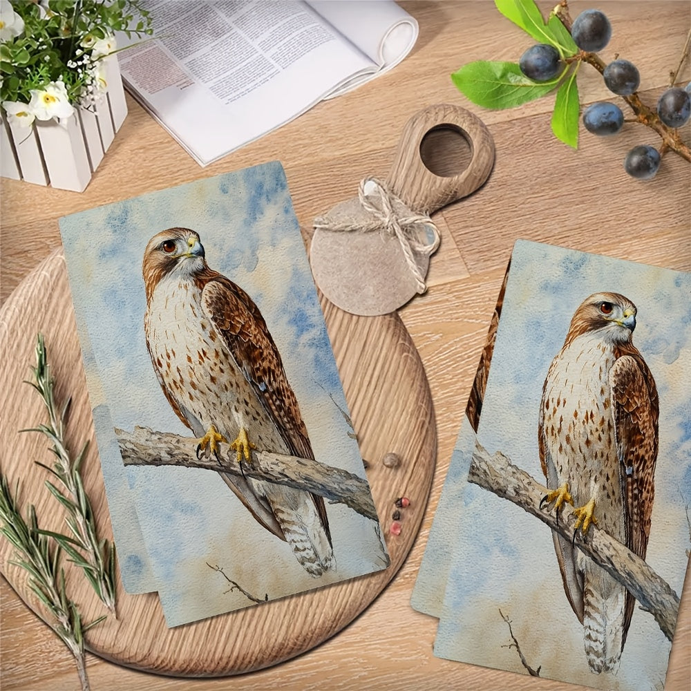 Two pieces of ultra-soft kitchen towels featuring a hawk perched on a branch design. These highly absorbent towels are machine washable and perfect for drying dishes or hands. Add a touch of contemporary coastal decor to your kitchen with these towels