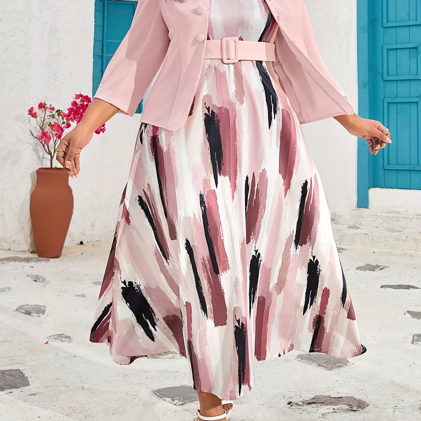 Stylish pink coat and vest dress set for plus-size women that enhances the figure.