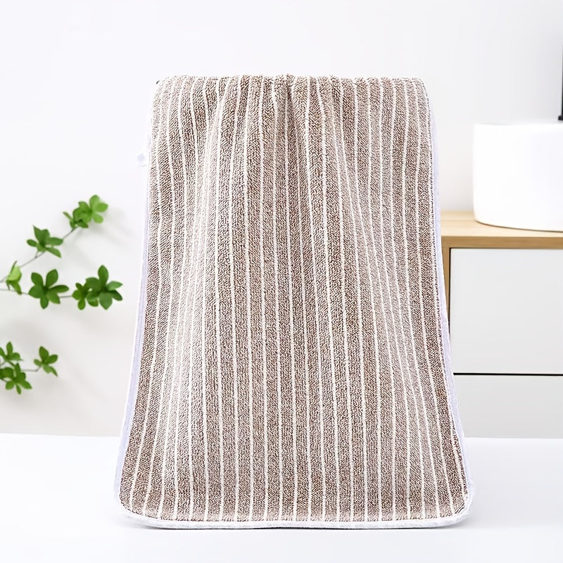 A 140cm*70cm plush bath towel perfect for home, hotel, kitchen, and more. Ultra-absorbent, soft, and gentle on skin.