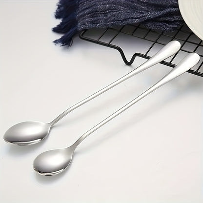 Set of 8 stainless steel long-handled spoons for tea, coffee, and ice cream. Dishwasher safe.