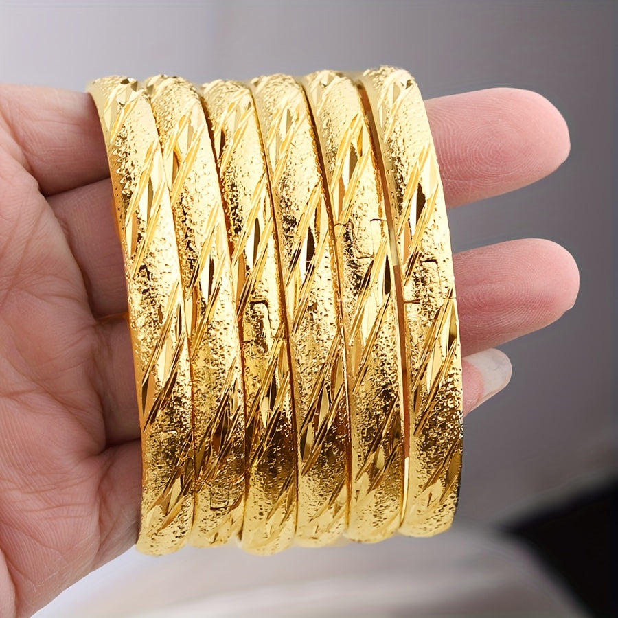 Set of 6 Middle Eastern style bangle bracelets, plated with 18K gold. This classical set is perfect for weddings, parties, and everyday wear for women.