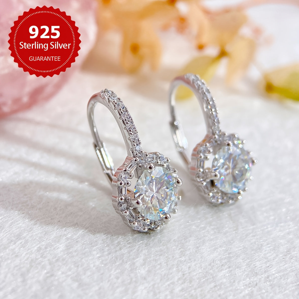 These elegant earrings feature two dazzling 1CT Moissanite round stones set in 925 sterling silver, with a total weight of approximately 2.91 grams. Perfect for weddings or as a luxurious Valentine's Day gift for your beloved.