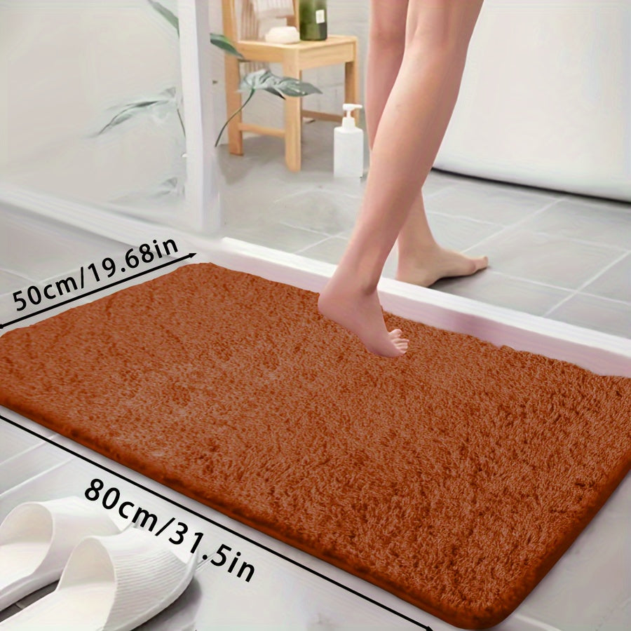 Ultra-soft bathtub mat with non-slip backing, absorbent and fade-resistant. Perfect for bathroom, laundry room, or entranceway.