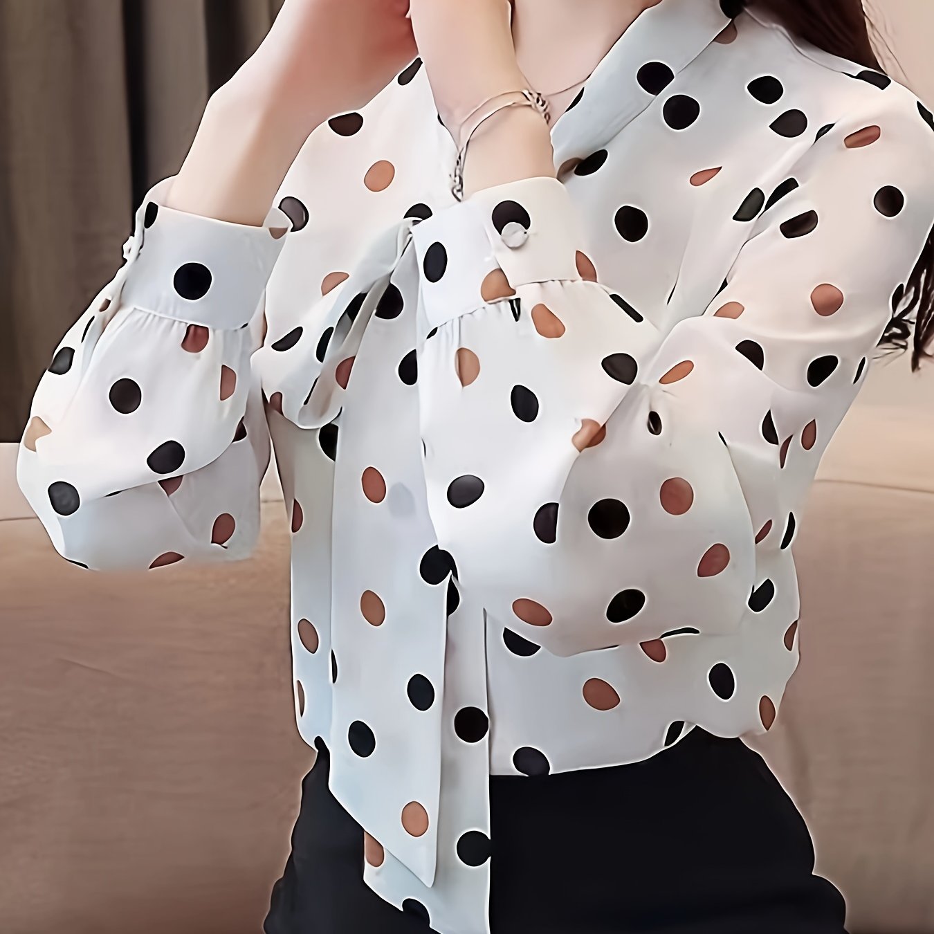 Women's elegant floral print blouse with tie-neck design, perfect for spring and summer fashion, made of lightweight polyester with semi-sheer finish and glossy look.