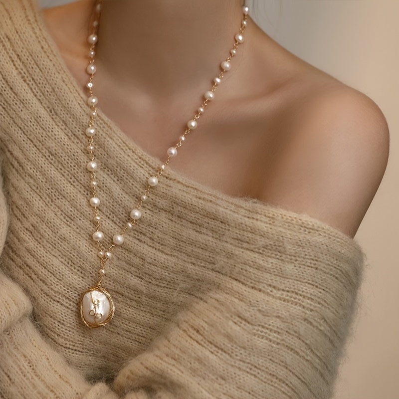 Vintage Baroque Pearl Necklace for Women - a stunning accessory that adds elegance to any outfit. Featuring freshwater pearls on a clavicle chain, this fashionable pendant boasts a simple yet stylish design. Made from high-quality alloy, this necklace is